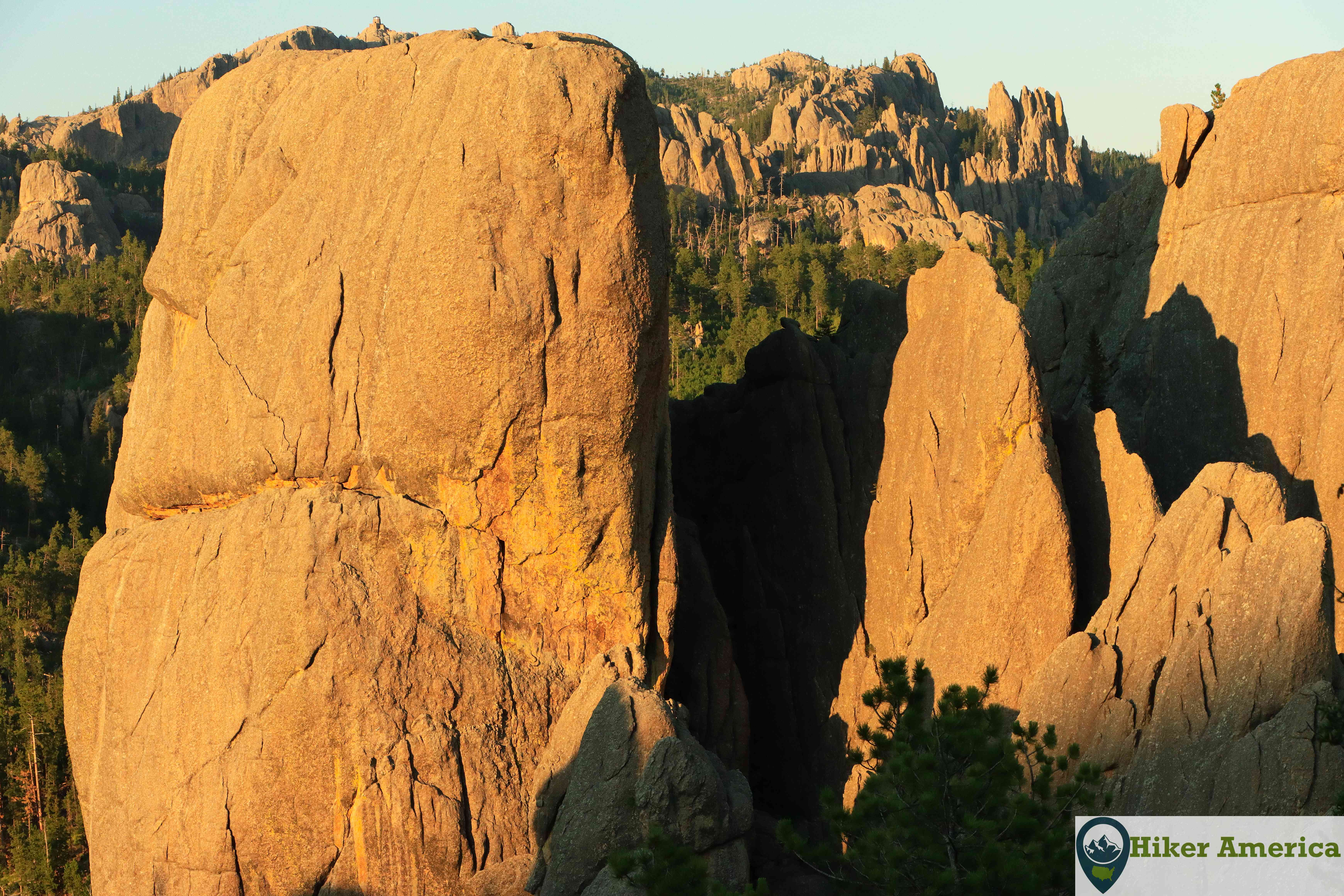 Evening light on Black Elk Peak with spires in the foreground.